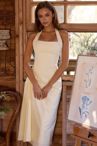 Bawełniana sukienka midi Tallulah z dekoltem halter w kolorze cytrynowym