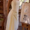 Bawełniana sukienka midi Tallulah z dekoltem halter w kolorze cytrynowym Bawełniana sukienka midi Tallulah z dekoltem halter w kolorze cytrynowym