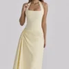 Bawełniana sukienka midi Tallulah z dekoltem halter w kolorze cytrynowym Bawełniana sukienka midi Tallulah z dekoltem halter w kolorze cytrynowym