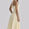 Bawełniana sukienka midi Tallulah z dekoltem halter w kolorze cytrynowym Bawełniana sukienka midi Tallulah z dekoltem halter w kolorze cytrynowym