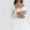 Biała mini spódniczka z kokardką Nahla Biała mini spódniczka z kokardką Nahla