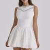 Biała mini sukienka Scarlett z haftowaną bawełnianą koronką Biała mini sukienka Scarlett z haftowaną bawełnianą koronką