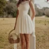 Biała mini sukienka Scarlett z haftowaną bawełnianą koronką Biała mini sukienka Scarlett z haftowaną bawełnianą koronką