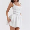 Biała mini sukienka Tiffani z koronkową lamówką Biała mini sukienka Tiffani z koronkową lamówką