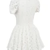 Biała plisowana mini sukienka Imani z angielską haftowaną koronką Biała plisowana mini sukienka Imani z angielską haftowaną koronką