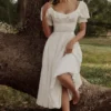 Biała sukienka midi Bella z angielską haftowaną koronką Biała sukienka midi Bella z angielską haftowaną koronką