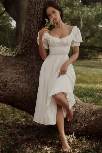 Biała sukienka midi Bella z angielską haftowaną koronką Biała sukienka midi Bella z angielską haftowaną koronką