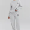 Bluza z okrągłym dekoltem w kolorze jasnoszarym melanżowym Bluza z okrągłym dekoltem w kolorze jasnoszarym melanżowym