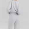 Bluza z okrągłym dekoltem w kolorze jasnoszarym melanżowym Bluza z okrągłym dekoltem w kolorze jasnoszarym melanżowym