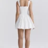 Brigitte Biała bawełniana mini sukienka z gorsetem w stylu broderie anglaise Brigitte Biała bawełniana mini sukienka z gorsetem w stylu broderie anglaise