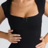 Czarny gorset z rękawkami typu cap sleeve Czarny gorset z rękawkami typu cap sleeve