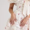 Jaide Elastyczna bawełniana sukienka mini z odkrytymi ramionami i kwiatowym nadrukiem Jaide Elastyczna bawełniana sukienka mini z odkrytymi ramionami i kwiatowym nadrukiem
