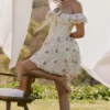 Jaide Elastyczna bawełniana sukienka mini z odkrytymi ramionami i kwiatowym nadrukiem Jaide Elastyczna bawełniana sukienka mini z odkrytymi ramionami i kwiatowym nadrukiem