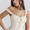 Jean Vintage Kremowa bawełniana bluzka z falbaną w stylu broderie anglaise Jean Vintage Kremowa bawełniana bluzka z falbaną w stylu broderie anglaise