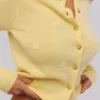 Kardigan Poppie Lemon z wełny i kaszmiru z kwiatowym haftem Kardigan Poppie Lemon z wełny i kaszmiru z kwiatowym haftem