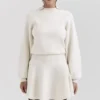 Mini spódniczka z falbanami „Rosina” z wełny i kaszmiru w kolorze kremowym Mini spódniczka z falbanami „Rosina” z wełny i kaszmiru w kolorze kremowym