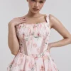 Mini sukienka bawełniana Kimmie w brzoskwiniowy kwiatowy wzór Mini sukienka bawełniana Kimmie w brzoskwiniowy kwiatowy wzór