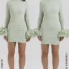 Mini sukienka Camilla Pistachio z falbanowymi mankietami