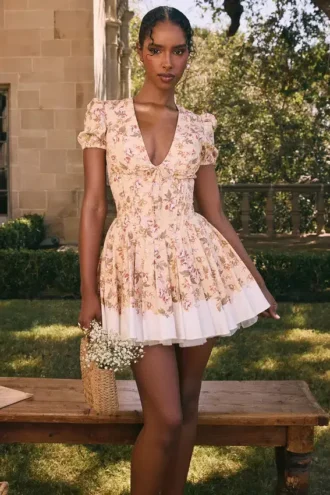 Mini sukienka z plisowanej bawełny z nadrukiem Imani Honeyflower Mini sukienka z plisowanej bawełny z nadrukiem Imani Honeyflower