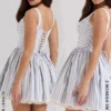 Niebieska sukienka mini w paski z plisami „Liesl” Niebieska sukienka mini w paski z plisami „Liesl”