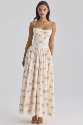 Rona – długa sukienka z bawełny w kolorze kości słoniowej z nadrukiem w stylu vintage Rona – długa sukienka z bawełny w kolorze kości słoniowej z nadrukiem w stylu vintage
