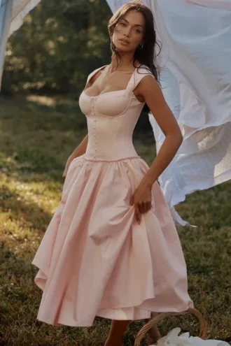 Różowa bawełniana sukienka midi z rękawkami typu cap sleeve „Kaia” Różowa bawełniana sukienka midi z rękawkami typu cap sleeve „Kaia”
