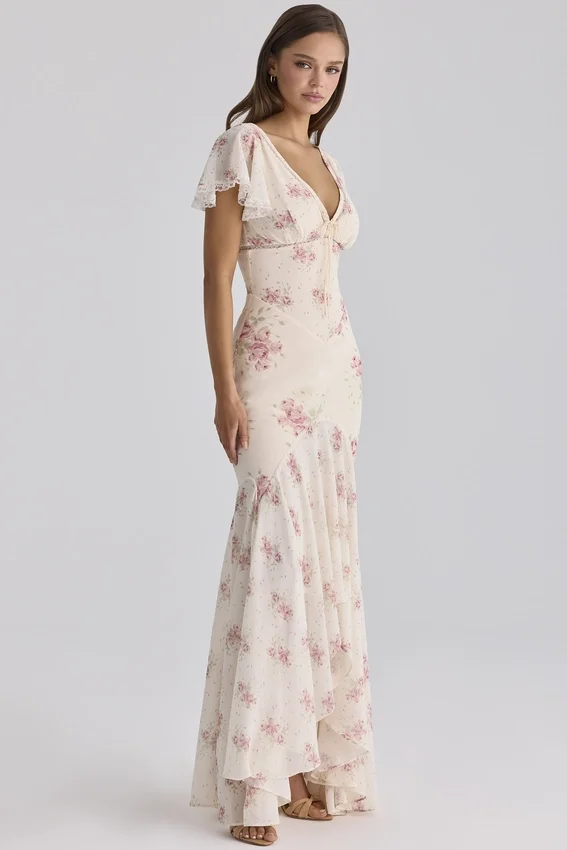 Sukienka maxi Amina w kolorze kości słoniowej z nadrukiem Vintage Rose z żorżety Sukienka maxi Amina w kolorze kości słoniowej z nadrukiem Vintage Rose z żorżety