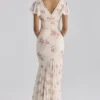 Sukienka maxi Amina w kolorze kości słoniowej z nadrukiem Vintage Rose z żorżety Sukienka maxi Amina w kolorze kości słoniowej z nadrukiem Vintage Rose z żorżety