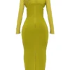 Sukienka maxi Zahra w kolorze chartreuse z głębokim dekoltem Sukienka maxi Zahra w kolorze chartreuse z głębokim dekoltem